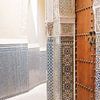 Wooden door in Morocco, medina of Fes (Fez) by Melissa Peltenburg