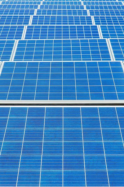 Symmetric blue field with many new solar collectors by Ben Schonewille
