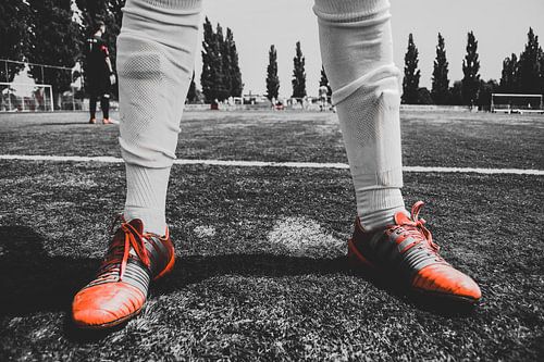 Fußballschuhe auf dem Spielfeld
