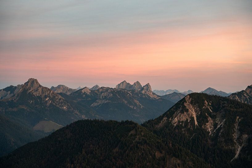 glowing red sky at sunset over the Tannheim mountains by Leo Schindzielorz
