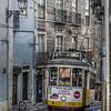 We nemen de tram in Lissabon van Wim van de Water