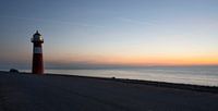 Noorderhoofd lighthouse at sunset in Westkapelle by Anouschka Hendriks thumbnail