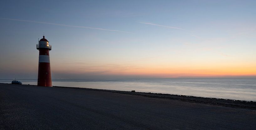 Noorderhoofd lighthouse at sunset in Westkapelle by Anouschka Hendriks
