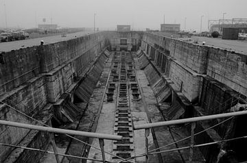 Abandoned dry dock shrouded in sea fog by Russell