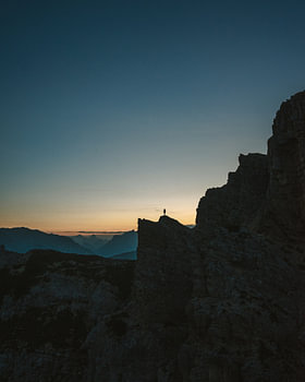 Evening light in the Dolomites: a portrait of a solitary traveller