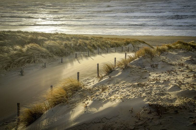Beach, sea and sun on a stormy evening! by Dirk van Egmond