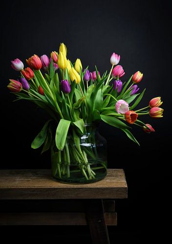 Still life bouquet of tulips in cheerful colors