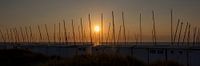 Zonsondergang aan zee