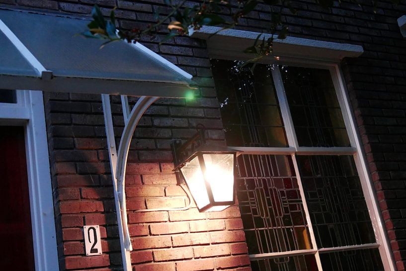 Utrecht - Lamp by stained glass by Wout van den Berg