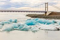 Bridge over a river with ice near the Jökulsárlón lake in Iceland