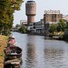 Watertoren Heuveloord in Utrecht met daarvoor de voormalige Pastoe fabriek aan de Vaartsche Rijn. van André Blom Fotografie Utrecht