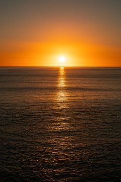 Sunset over the sea by Leo Schindzielorz