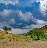 a view in the turkish mountains with threatening sky