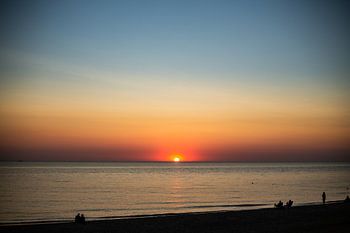Zonsondergang aan het strand