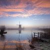 Lever de soleil brumeux à Kinderdijk sur Frank Laurens