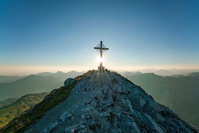 View of the Tannheim mountains with the summit cross from gaishorn by Leo Schindzielorz