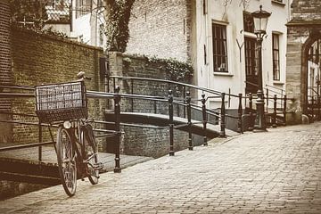 The Dutch city of Gouda with a bicycle in front by Martin Bergsma