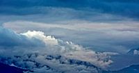 clouds rolling over the hills von rene schuiling Miniaturansicht