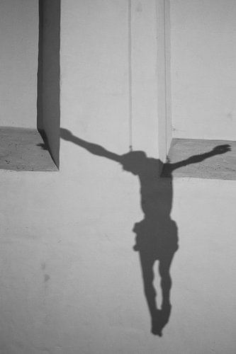 Jesus’ shadow on the wall