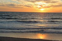 Sonnenuntergang gespiegelt bei Westerland auf Sylt