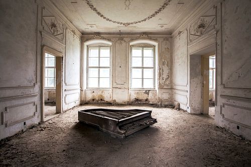Abandoned Piano in the middle of the room