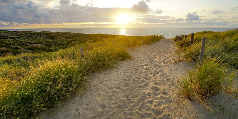 Sun and sea at the beach by Dirk van Egmond