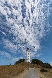 Sheep clouds over the lighthouse "Am Dornbusch" on Hiddensee