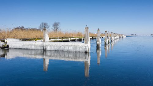 Icicles and frozen water along the waterfront