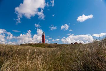 Dunes,sea and a lighthouse