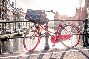 Vélo sur le canal d'Amsterdam sur Charles Poorter