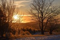A sunrise on a cold morning