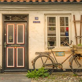 cottage with bicycle in front by Guy Lambrechts