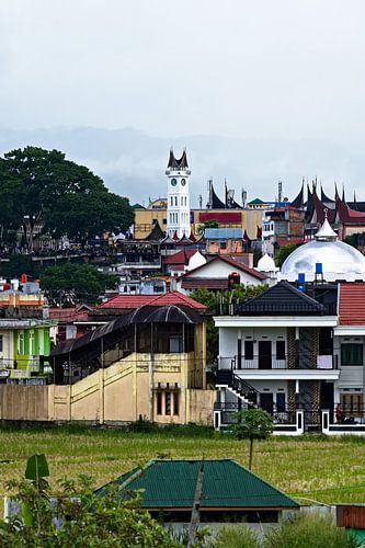 An urban skyline shrouded in Indonesian mist