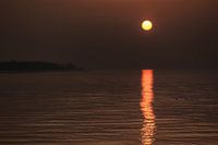 Avondzon met reflectie