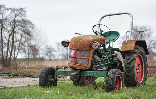 Wat een leuke uitstraling zo'n oude tractor