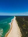 Aerial photography the divide between water and land by Ken Tempelers thumbnail