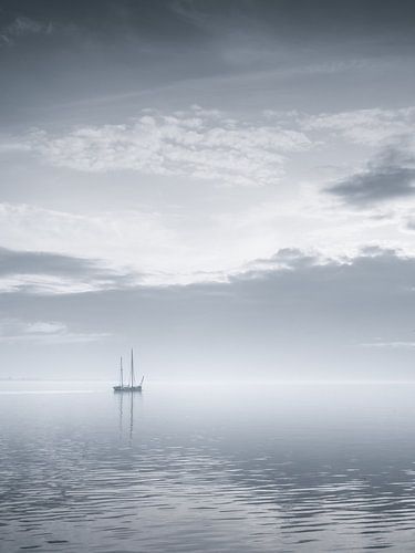 A lovely misty afternoon by the Zeeland Bridge in Zeeland with a k by Bas Meelker