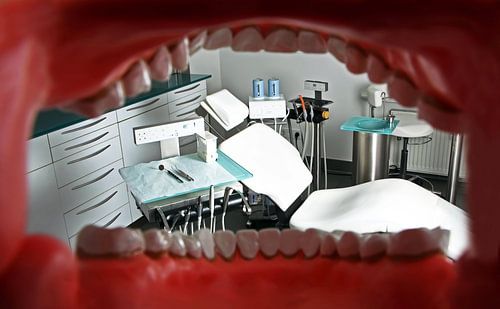 View through a set of teeth to the dentist's chair