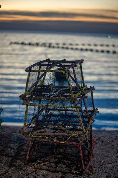 Fish traps ready for catch at sunset by Franklin Driessen