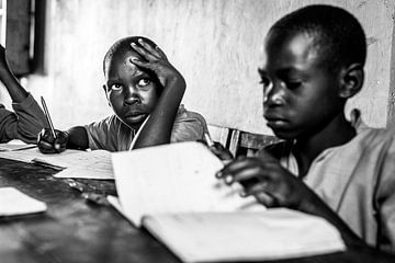Concentrating on studying in a classroom in Uganda by Milene van Arendonk