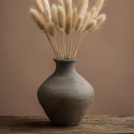 Vase with feathers by Raoul van Meel