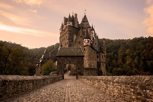 Cobbled street towards Burg Eltz Castle in the morning light