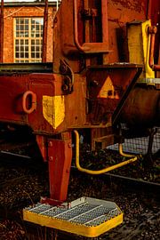 Railcar in Golden Light – Rust, Red & Yellow