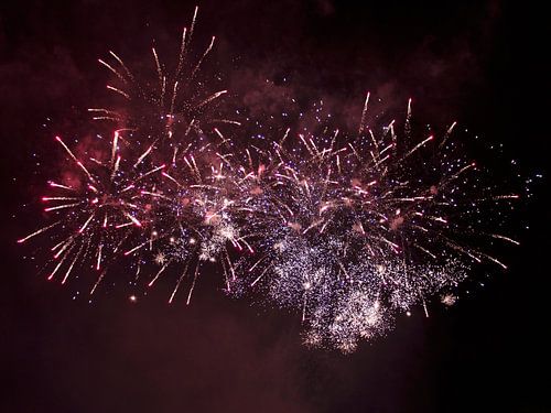 Red / purple fireworks during Divali / Old & New