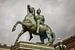 Godin op een paard op de Piazza Castello in Turijn in Italië van Joost Adriaanse