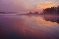 Serene morning rest during sunrise in De Wieden