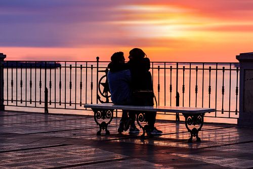 Two lovers in a colorful sunset by Gea Gaetani d'Aragona