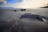 Zonsondergang op Inch Beach, Ierland