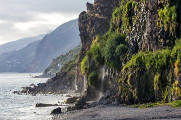 Waterfall on the beach in Madeira (Portugal) by Rick Van der Poorten