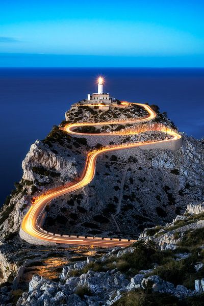 Far de Formentor lighthouse at Cap Formentor on Mallorca in the evening at night by Daniel Pahmeier